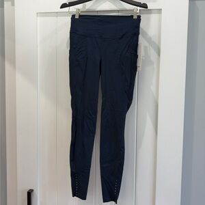 New w/ tags, true navy Lululemon fast and free HR tight 28 inch, pockets size 8
